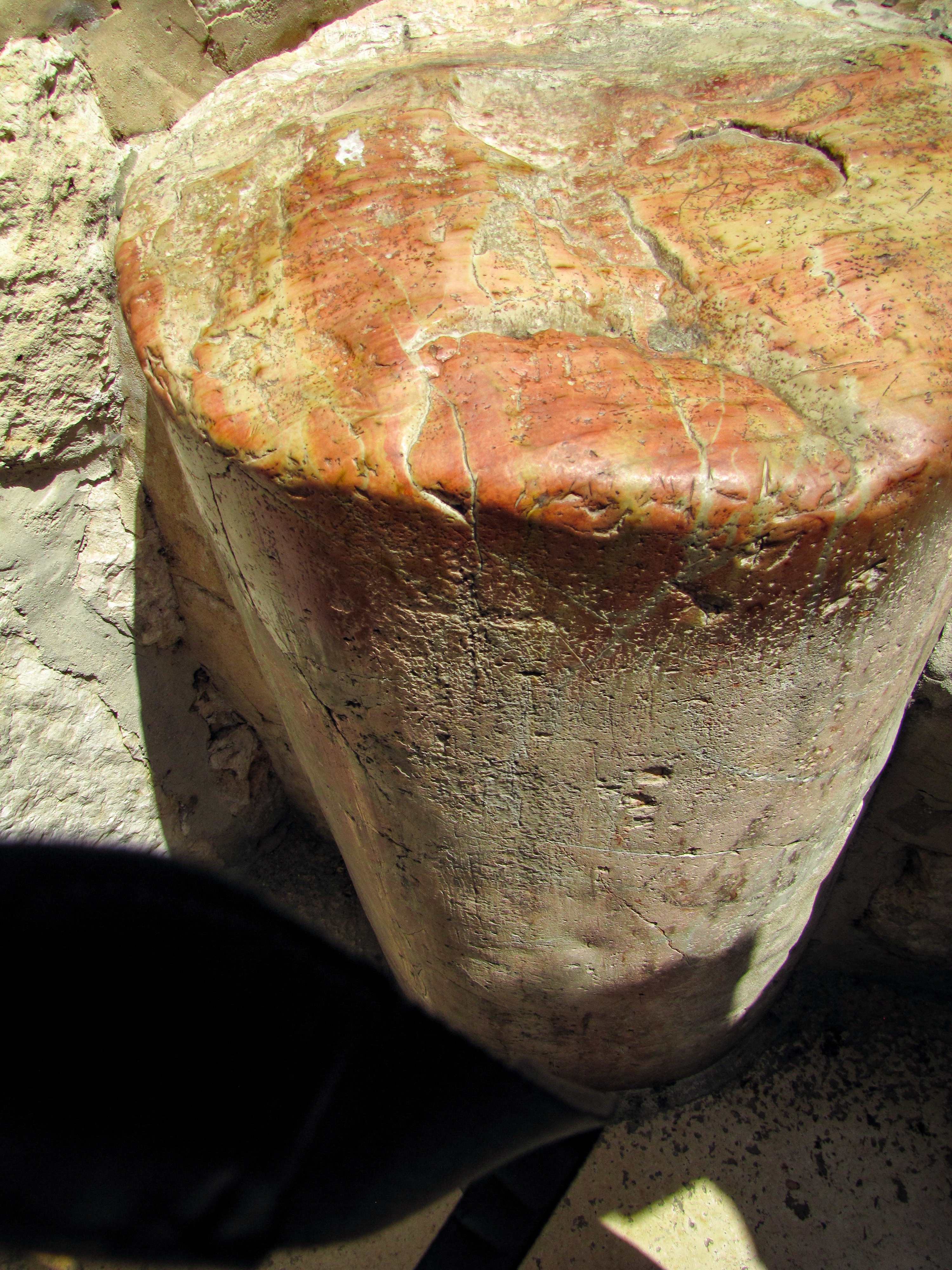 Pillar outside the church by the small opening